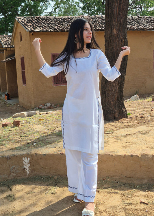 PURE WHITE EMBROIDERED COTTON KURTA SET.